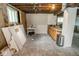 Unfinished basement with exposed ceiling and a small counter area at 300 E 2Nd St, Sheridan, IN 46069