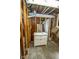 Unfinished basement featuring a new vanity, exposed framing and utilities at 300 E 2Nd St, Sheridan, IN 46069