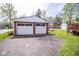 Two-car garage with plenty of parking space and easy access from the backyard at 300 E 2Nd St, Sheridan, IN 46069