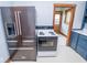 This kitchen boasts stainless steel refrigerator and matching oven set at 300 E 2Nd St, Sheridan, IN 46069