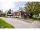This home is accompanied with a detached garage with a wide parking area of packed gravel at 300 E 2Nd St, Sheridan, IN 46069