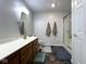 Bathroom with glass shower, sleek vanity and neutral decor at 3085 Oakmont Dr, Lapel, IN 46051