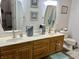Bathroom featuring double sinks and updated fixtures at 3085 Oakmont Dr, Lapel, IN 46051