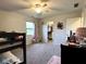 Bright bedroom with bunk beds and access to a walk-in closet providing storage at 3085 Oakmont Dr, Lapel, IN 46051