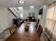 Open-concept living and dining area with plenty of natural light at 3085 Oakmont Dr, Lapel, IN 46051