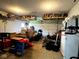 Spacious two-car garage is well-organized with shelving and plenty of room for parking and storage at 3085 Oakmont Dr, Lapel, IN 46051