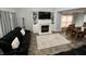 Cozy living room featuring a fireplace and built-in shelving at 3085 Oakmont Dr, Lapel, IN 46051