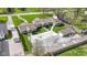 Charming single story home with a detached garage and a large concrete driveway perfect for multiple vehicles at 32 W Michigan St, Greenfield, IN 46140