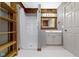 Bright bathroom featuring shower, vanity, mirror and stylish tile flooring at 32 W Michigan St, Greenfield, IN 46140