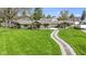 A stunning single-story home featuring a beautifully maintained lawn and a charming walkway, offering curb appeal at 32 W Michigan St, Greenfield, IN 46140