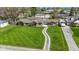 Serene single story home with a stone walkway and large grassy front yard creating a picturesque setting at 32 W Michigan St, Greenfield, IN 46140