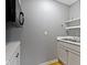 Neutral kitchen featuring stainless steel sink, white cabinets, and hardwood flooring at 32 W Michigan St, Greenfield, IN 46140