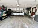 Functional garage offering ample storage with wall-mounted cabinets and workspace at 337 Leaning Tree Rd, Greenwood, IN 46142