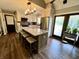 Modern kitchen with a large island, seating, stainless steel appliances, and lots of cabinet space at 337 Leaning Tree Rd, Greenwood, IN 46142