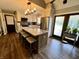 Bright kitchen with stainless steel appliances, large island, and lots of light from backyard view at 337 Leaning Tree Rd, Greenwood, IN 46142