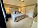 Comfortable main bedroom featuring vaulted ceiling, with a decorative headboard, and a ceiling fan at 337 Leaning Tree Rd, Greenwood, IN 46142