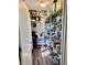 Walk-in pantry provides ample storage with both built-in shelving and wire racking for organization and accessibility at 337 Leaning Tree Rd, Greenwood, IN 46142