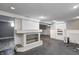 Finished basement space with fireplace and shelving at 3549 N Sherman Dr, Indianapolis, IN 46218