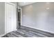 Bedroom with closet and modern gray vinyl plank flooring at 3549 N Sherman Dr, Indianapolis, IN 46218