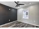 Bedroom with a neutral color palette and hardwood-style flooring at 3549 N Sherman Dr, Indianapolis, IN 46218