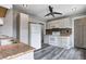 Kitchen featuring stone countertops, mosaic backsplash, and ample cabinet storage at 3549 N Sherman Dr, Indianapolis, IN 46218