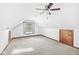 Bright bedroom with window, neutral carpet, and wooden trim at 4152 S Creekside Dr, New Palestine, IN 46163