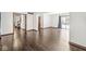 Spacious living room features hardwood floors and leads to the backyard at 4152 S Creekside Dr, New Palestine, IN 46163