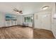 Bright living room featuring laminate floors, a large window, and a welcoming atmosphere at 431 Fox Cir, Noblesville, IN 46060