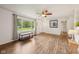 Inviting living room with laminate floors, a window, and a neutral color scheme at 431 Fox Cir, Noblesville, IN 46060