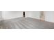 Clean bedroom with carpeting, a large window, and an entry door at 4411 Persian St, Greenwood, IN 46143