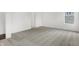 Bright bedroom featuring soft carpeting, ample lighting, and neutral paint at 4411 Persian St, Greenwood, IN 46143