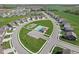A beautiful aerial view of neighborhood amenities including a pool and playground at 4985 W Burrel Ln, New Palestine, IN 46163