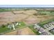 A beautiful aerial view of a neighborhood surrounded by luscious farmland at 4985 W Burrel Ln, New Palestine, IN 46163