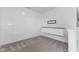 Cozy bonus room with mounted TV bracket and built-in cabinets at 4985 W Burrel Ln, New Palestine, IN 46163