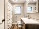 Updated bathroom with modern vanity, mirror, and shower, ideal for daily comfort at 5450 Fenmore Rd, Indianapolis, IN 46228
