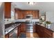 Well-equipped kitchen featuring stainless steel appliances and sleek countertops at 5550 Sweet River Dr, Indianapolis, IN 46221