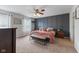 Serene primary bedroom featuring stylish accents, plush carpet, and ample natural light at 5550 Sweet River Dr, Indianapolis, IN 46221