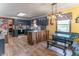 Bright kitchen with custom breakfast nook, stainless steel appliances, and granite countertops at 5901 W Thompson Rd, Indianapolis, IN 46221