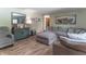 Comfortable living room featuring neutral colors, plush seating, and natural light at 5901 W Thompson Rd, Indianapolis, IN 46221