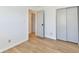 Cozy bedroom with a closet offering plenty of storage space and hardwood floors at 609 Delray Dr, Indianapolis, IN 46241