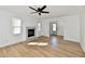 Inviting living room with fireplace, wood floors, and natural light, creating a warm and comfortable atmosphere at 609 Delray Dr, Indianapolis, IN 46241