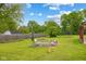 Beautiful backyard with a large yard and wooded privacy at 6123 W 46Th St, Indianapolis, IN 46254