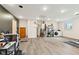 Spacious basement featuring sleek flooring, modern washer/dryer, and utility access at 6123 W 46Th St, Indianapolis, IN 46254