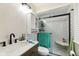 Updated bathroom with a modern vanity, toilet, and subway tiled shower at 6123 W 46Th St, Indianapolis, IN 46254