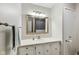 Cozy bathroom with classic vanity, lighting and a towel rack at 6123 W 46Th St, Indianapolis, IN 46254