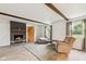 Comfortable living room featuring a modern fireplace, hardwood floors, and plenty of space at 6123 W 46Th St, Indianapolis, IN 46254