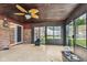 Relaxing enclosed patio with a wooden ceiling and views of the backyard at 6123 W 46Th St, Indianapolis, IN 46254