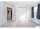 This bedroom offers natural light, carpeted floors, a closet, and neutral paint, creating a serene space at 6144 Black Oaks Way, Indianapolis, IN 46237