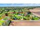 Expansive property featuring a beautiful home, pond, and surrounding greenery at 6149 W Olive Branch Rd, Greenwood, IN 46143