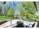 Backyard patio with seating offers an excellent spot for outdoor relaxation at 6149 W Olive Branch Rd, Greenwood, IN 46143